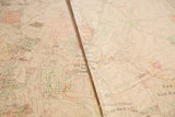 Vintage Hopkins map detail, showing central rip and varied color markings.