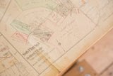 Vintage Hopkins map corner, aged paper texture, visible fold, and Bedford Village text.