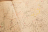 Vintage North Castle map detail showing handwritten red notes and yellow highlights.