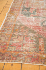 Distressed texture of vintage Oushak rug runner with original side selvage.