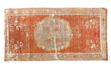 Vintage distressed Oushak runner, cinnabar red field, silver roundel medallion, floral, cloud bands.