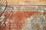 Distressed vintage Oushak runner with faded cinnabar red, oxidized silver, and ivory foundation.