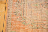 Distressed Oushak rug runner pile showing even wear to foundation and secured side.