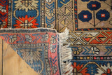 Hand-knotted reverse foundation and fringe of an antique Caucasian rug.