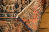 Antique Malayer rug folded corner, hand-knotted reverse, intricate Herati pattern in blue, madder, and beige.