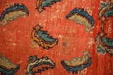 Antique Hamadan rug detail: Herati Mahi motifs on abrashed red field, visible foundation wear.