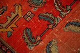 Antique Hamadan rug: Floating Herati motifs on abrashed red field, light foundation visible.