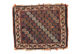 Antique Afshar Bag Face square rug featuring allover repeating minor gul motifs in indigo blue, wine red, and ivory, 1'8