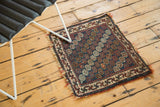 Hand-knotted Antique Persian Afshar rug with indigo, wine gul motifs, tattered edges.