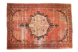Antique Farahan Sarouk rug, central roundel medallion, floral vinery, blush, ivory, navy, 7' x 10'.