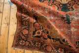 Delicate vinery and floral blossoms on antique Farahan Sarouk, showing rich abrash and wear.