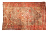 Antique Persian Doroksh carpet featuring stepped diamond medallion, blush, rose, neutral tones, 6' x 9'.