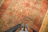 Antique Persian Doroksh rug with blush diamond medallion, tree-of-life, and bird motifs.