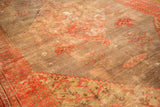 Antique Doroksh rug's time-softened pile showing stepped medallion and corner spandrel.