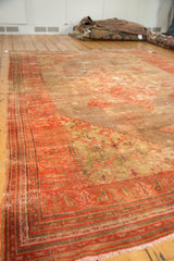 Intricate stepped spandrel and blush, dusty rose border on an antique Persian Doroksh rug.