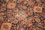 Intricate Herati pattern on Antique Malayer rug, displaying navy, madder root, ivory, and subtle patina.