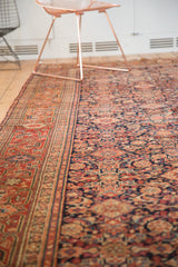 Detail of antique Malayer runner, showing rich madder root red border and navy Herati pattern.