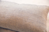 Reclaimed Remnant Pillow's cream fabric with fine blue woven texture.