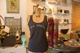 Gunpowder grey women's racerback tank with white arched 