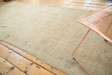 Vintage Oushak rug pile shows subtle tone-on-tone abrashes in neutral hues.