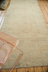 Textured ivory pile and intact original selvage of this vintage Oushak runner.