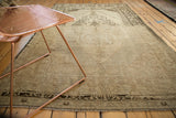 Vintage Oushak rug, lower corner detail with diamond overlay pattern in ivory and chocolate brown.