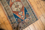 Starburst medallion, stepped spandrels, and abrashed field on a hand knotted vintage Oushak rug.