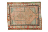Vintage Oushak prayer rug: blush field, blue prayer niche, lantern, and checker motifs. 2'9