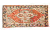 Distressed Oushak runner, faded cherry red field, ivory medallion, charcoal borders, 2'7