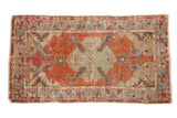 Distressed vintage Oushak runner: hexagonal medallion, cherry red, faded blue, and sand tones.