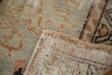 Distressed Oushak rug's worn pile and reverse showing hand knotted foundation.