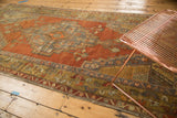 Detailed section of the vintage Anatolian runner, showcasing geometric field motifs in burnt orange and faded denim.