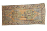 Distressed vintage Oushak rug with double rectilinear medallion, dusty gold, sage green, and blues. 4'6