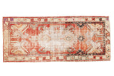 Vintage distressed Oushak runner with cherry red, ivory medallion and geometric borders.