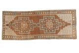 Distressed Oushak runner with double medallions, geometric floral designs, bronze and silver.