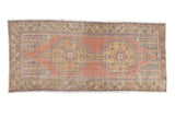 Distressed Oushak runner, double floral medallions, cinnabar red, gold, faded blue. 4'5