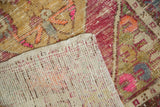 Distressed pile and light foundation of a hand-knotted vintage Oushak rug with original selvage.