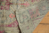 Vintage Oushak rug pile with even wear, visible foundation, and hand-knotted reverse.