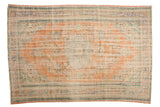 Distressed Oushak carpet, pale terra cotta, faded blue floral medallion, 6'9