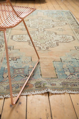 Distressed Oushak rug texture with low pile, ivory and sea foam geometric pattern.