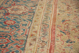 Circa 1920s Persian Mahal carpet: sky blue Herati field and unusual gem tone border.
