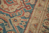 Textured hand-knotted pile of the Antique Mahal carpet, highlighting its herati motif in antique ivory, sky blue, and cherry red.