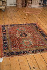 Close-up of the tattered end and original selvage of an antique Karaja rug.