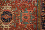 Finely hand-knotted Karaja geometric pattern with serrated contours in red, teal, and navy.