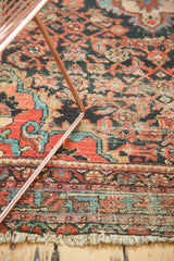 Worn madder root red and blue Herati motifs on vintage Malayer rug, secured fringe.