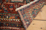 Geometric hand-knotted pile and reverse woven foundation of vintage Karaja runner with colorful fringe.