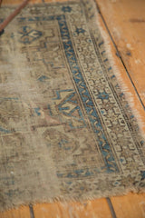 Antique Chi Chi rug detail showing low pile, sky blue starburst border, and storied edges.