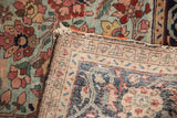 Antique Farahan Sarouk rug's hand-knotted foundation, floral pile, and tattered fringe detail.