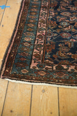 Vintage Hamadan rug corner detailing blush and teal inner border with boteh motifs.