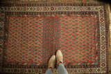 Antique Hamadan rug: madder root red field, allover staggered boteh, fantastic abrash, and vibrant border colors.